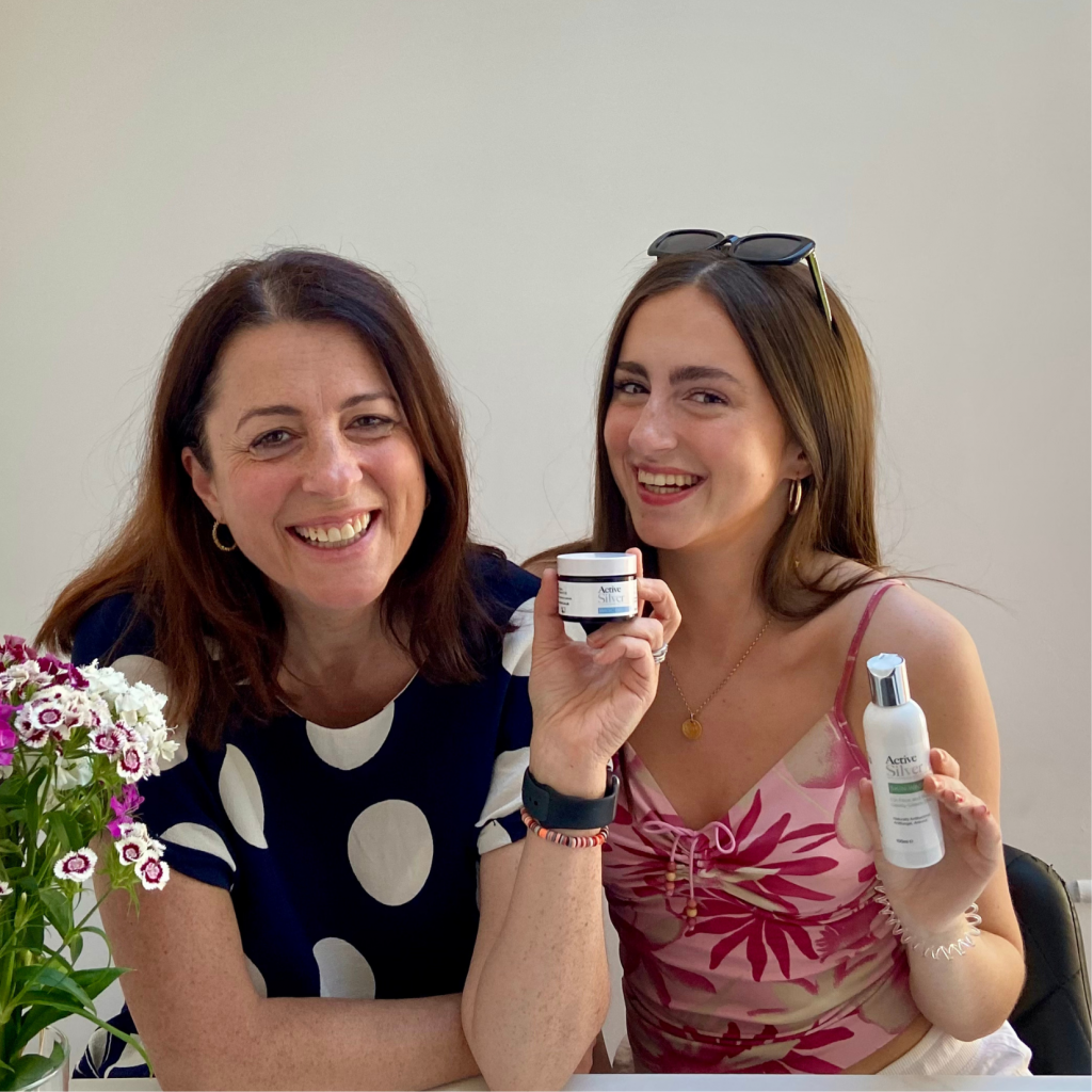 Jenny and her daughter pictured with active silver skincare products