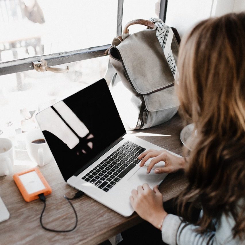 Women pictured working on content on her computer